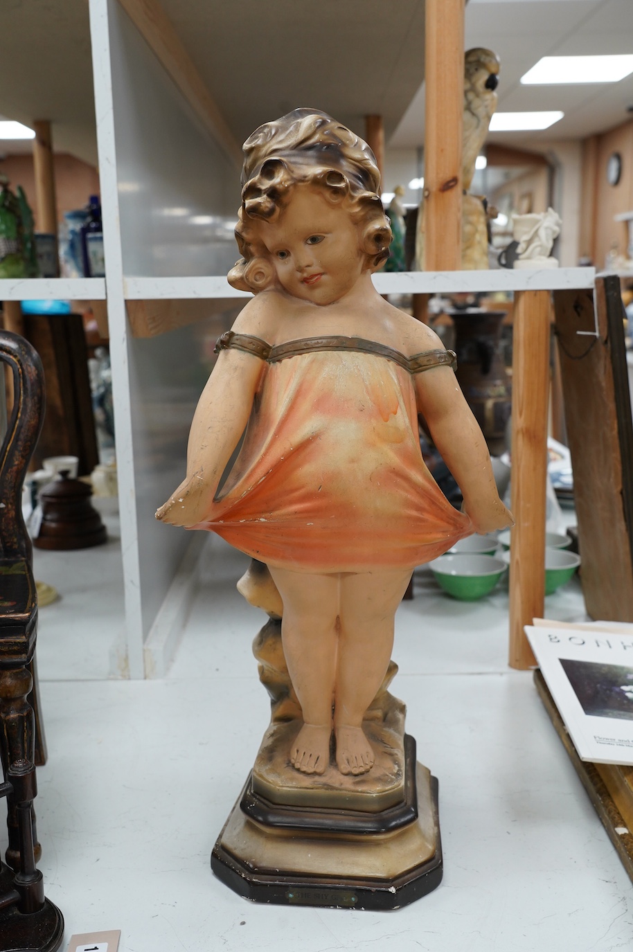 An Art Deco plaster figurine ‘Shy Girl’, 59cm high. Condition - poor to fair